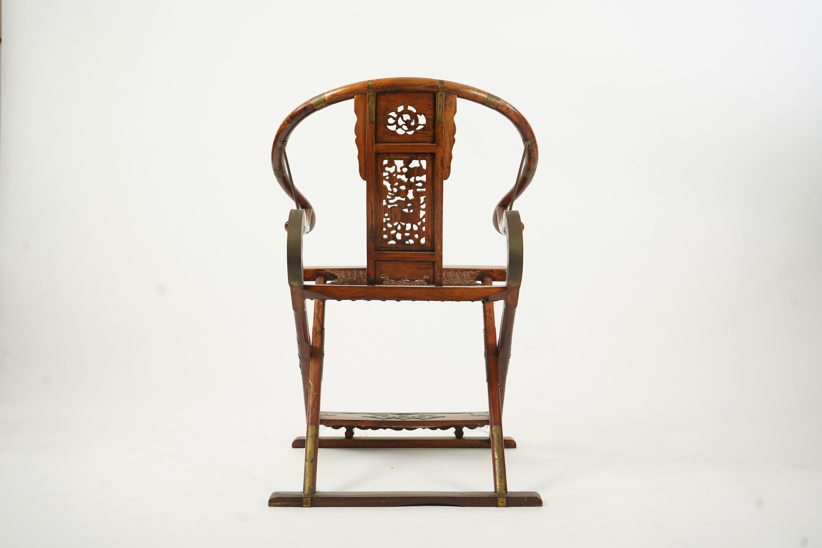 A Chinese huanghuali, hongmu and brass mounted folding hunting chair, jiaoyi, early 20th century